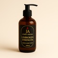 Brown bottle of JA Josie's Aroma Unbroken Strength Hand & Body Wash on a beige background